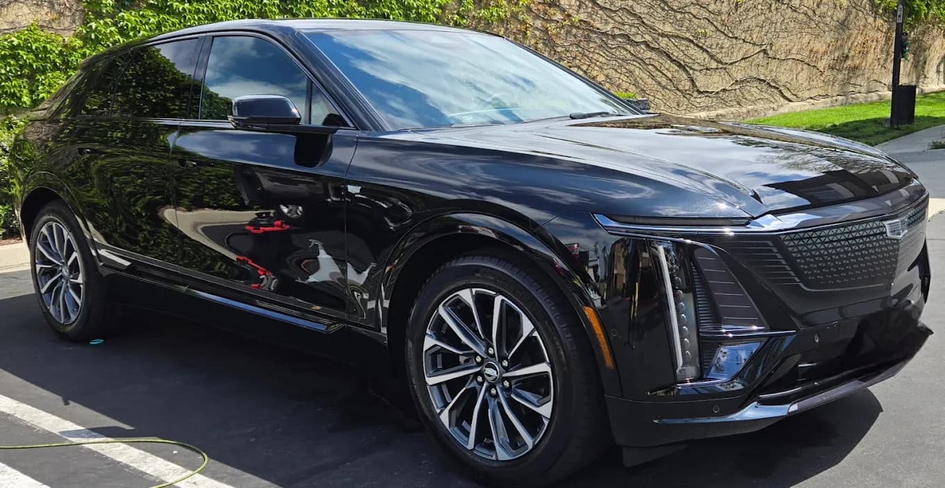 Black Cadillac SUV after a full detail.
