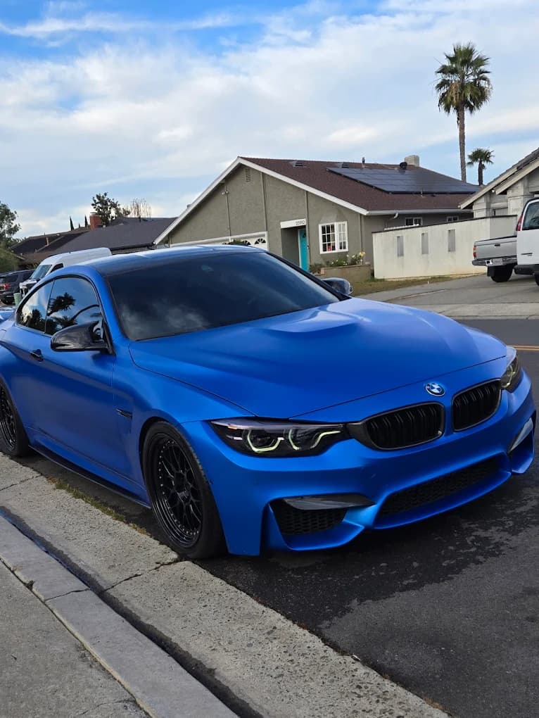 Blue BMW after a detailing appointment.